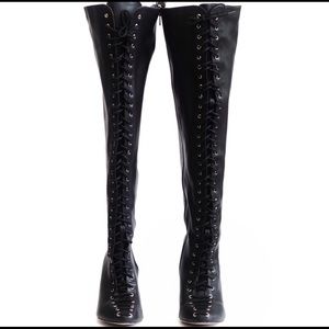 Torrid 10w thigh high boots.